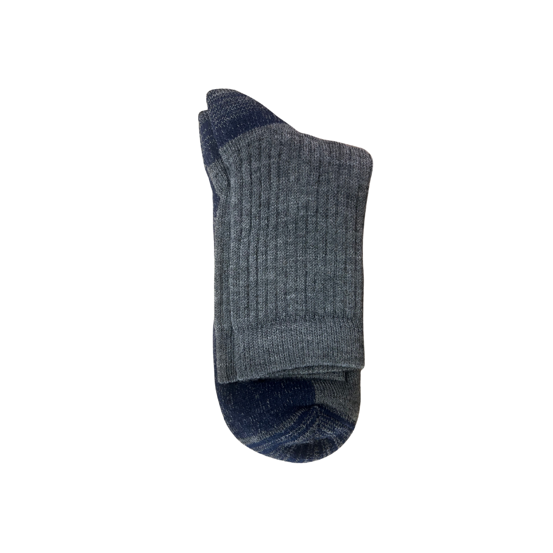 A pair of ribbed socks in Grey with navy blue accents on the toe & heel.