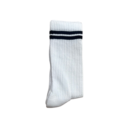 A single white ribbed crew sock with two dark black stripes near the cuff