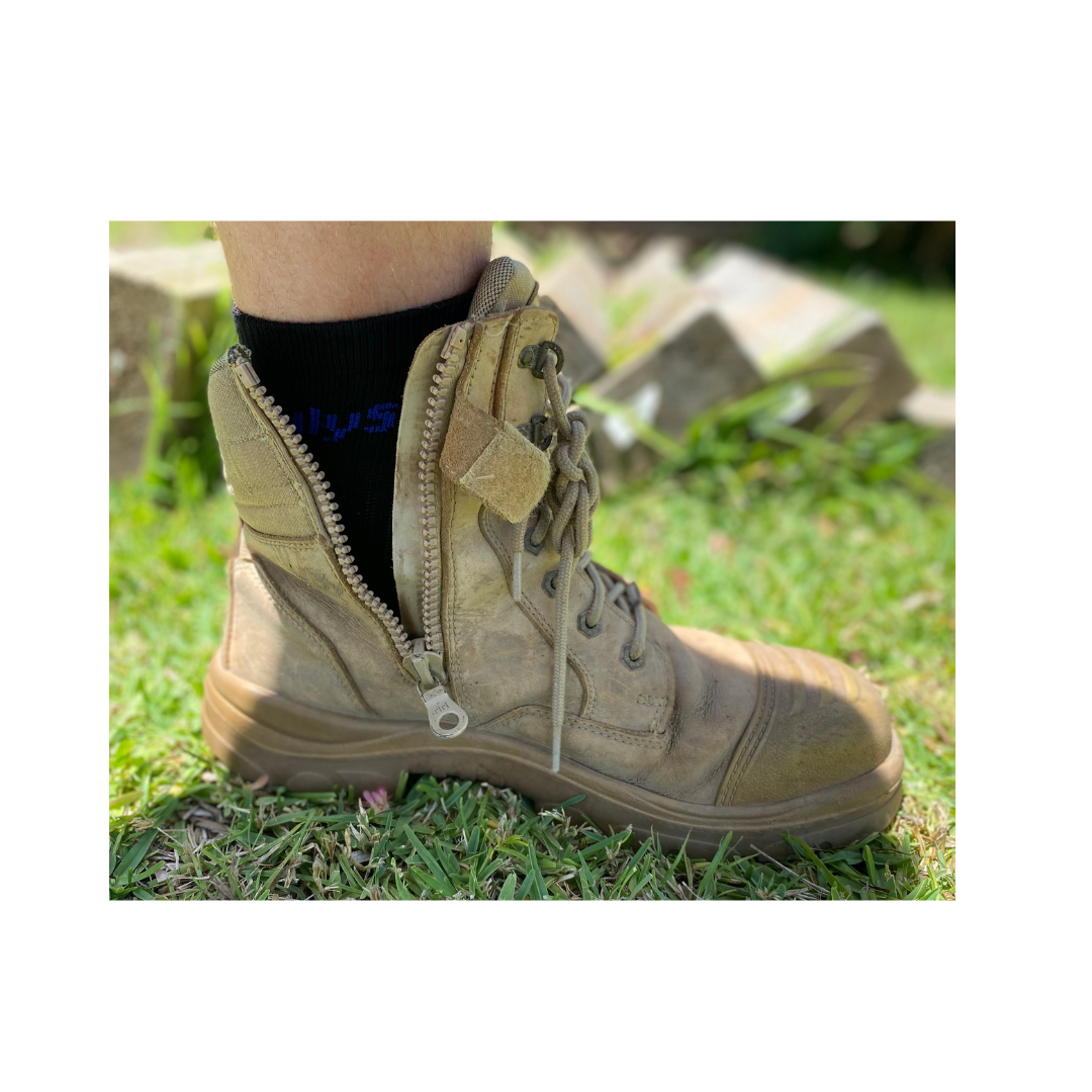 photo of Only socks No show socks in a boot... picture shows that the sock ends at the same height as the tongue of a work boot, eliminating excessive sock tans. 